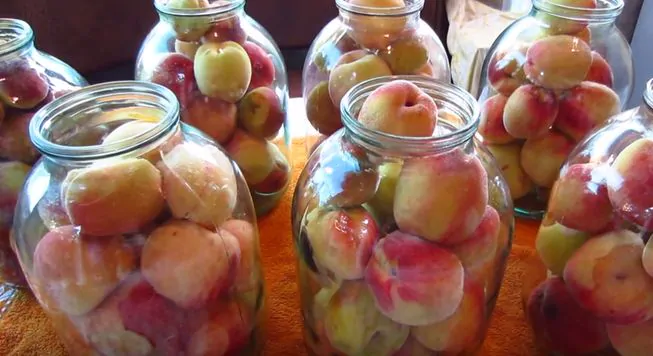 Приготовление вкусного компота из персиков на зиму
